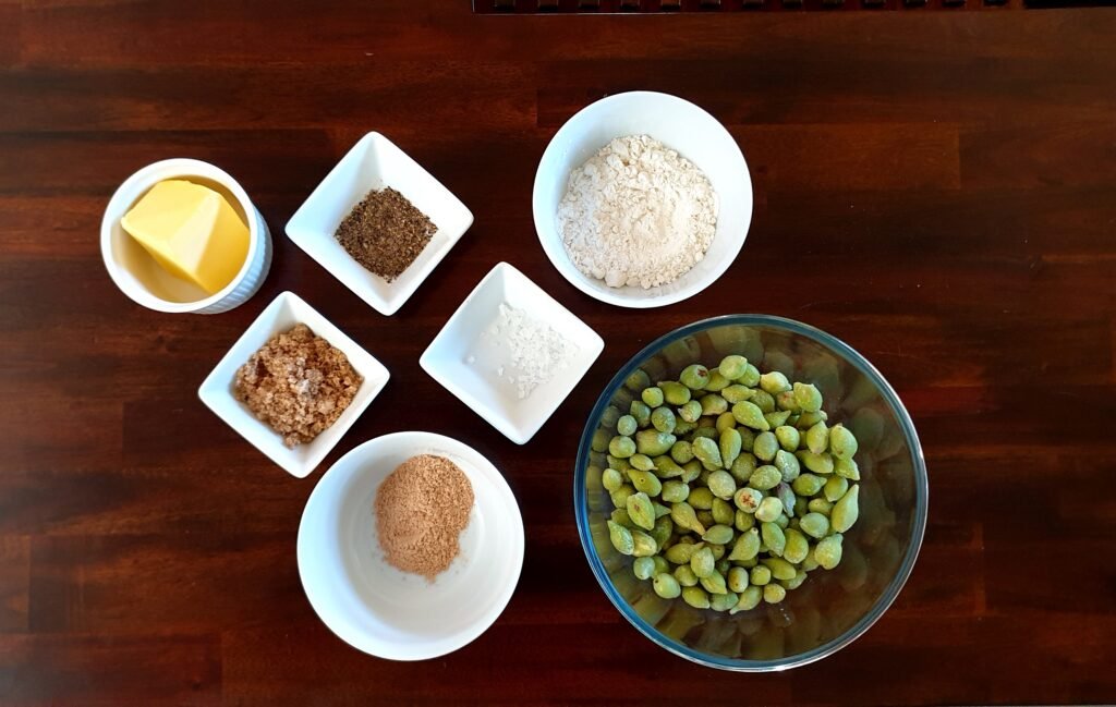 Cooking Plates with various ingredients and a bowl of Kakadu plum, gabiny.